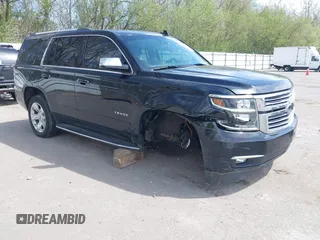 2015 Chevrolet Tahoe LTZ with VIN 1GNSKCKC8FR514671, listed as a IAAI auction lot 42157084 with 182,665 mi miles and . Bid and sale history available at DreamBid. Image 1.