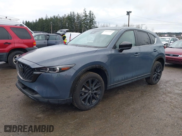 2023 Mazda CX-5 2.5 S Carbon Edition with VIN JM3KFBCM3P0133600, listed as a IAAI auction lot 41693803 with 42,323 mi miles. Bid and sale history available at carsss.com. Image 2.