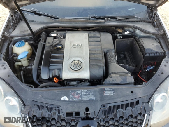 2007 Volkswagen GTI z VIN WVWFV71KX7W125003, wystawiony jako Copart lot #89388435 z przebiegiem Nie podano mil oraz Szkoda całkowita • Salvage title. Historia ofert i sprzedaży dostępna na DreamBid. Obrazek 11.
