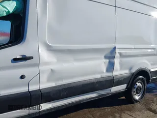 2020 Ford Transit Cargo with VIN 1FTBW3X82LKA91396, listed as a IAAI auction lot 41310803 with 60,760 mi miles and . Bid and sale history available at DreamBid. Image 17.