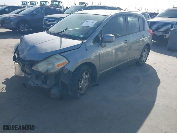 2009 Nissan Versa 1.8 S with VIN 3N1BC13E99L393920, listed as a IAAI auction lot 41813316 with 131,447 mi miles. Bid and sale history available at carsss.com. Image 2.
