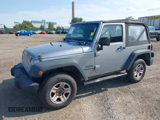 2013 Jeep Wrangler Sport with VIN 1C4AJWAG5DL639365, listed as a IAAI auction lot 40342277 with 117,109 mi miles and . Bid and sale history available at DreamBid. Image 2.