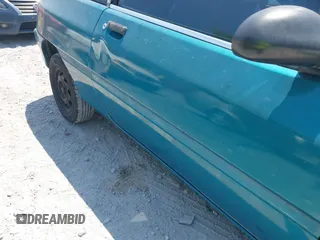 1995 Ford Aspire with VIN KNJLT05H3S6102568, listed as a IAAI auction lot 42062381 with 178,561 mi miles and . Bid and sale history available at DreamBid. Image 12.