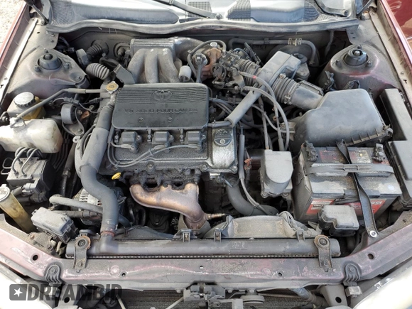2001 Toyota Camry LE z VIN JT2BF22K610295178, wystawiony jako Copart lot #68538524 z przebiegiem 507 822 mil mil oraz Szkoda całkowita • Salvage title. Historia ofert i sprzedaży dostępna na DreamBid. Obrazek 11.