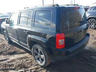 2014 Jeep Patriot High Altitude with VIN 1C4NJPFAXED888929, listed as a IAAI auction lot 41474736 with 117,697 mi miles and . Bid and sale history available at carsss.com. Image 3.