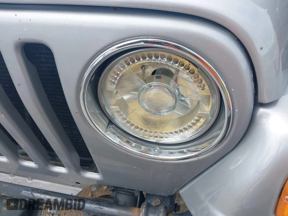 2002 Jeep Wrangler Sport with VIN 1J4FA49S52P717811, listed as a IAAI auction lot 42449753 with 252,258 mi miles and . Bid and sale history available at DreamBid. Image 6.