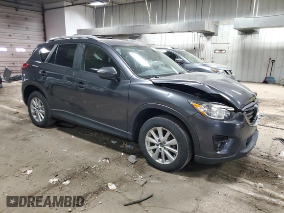 2016 Mazda CX-5 Touring with VIN JM3KE4CY9G0790872, listed as a Copart auction lot 54868385 with 82,569 mi miles and Clean Title. Bid and sale history available at carsss.com. Image 4.
