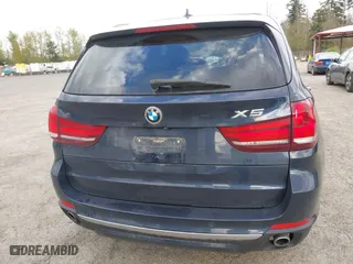 2015 BMW X5 xDrive35d with VIN 5UXKS4C55F0J98874, listed as a IAAI auction lot 42030583 with 151,079 mi miles. Bid and sale history available at carsss.com. Image 16.