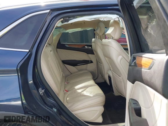 2015 Lincoln MKC with VIN 5LMTJ2AH2FUJ12531, listed as a IAAI auction lot 41639903 with 112,835 mi miles. Bid and sale history available at carsss.com. Image 8.