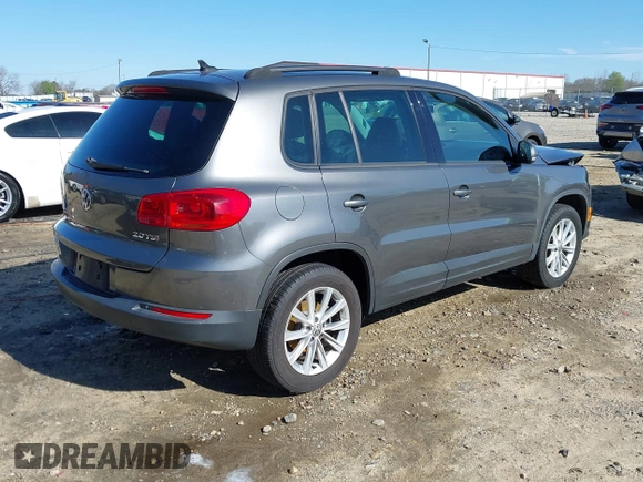 2014 Volkswagen Tiguan SE z VIN WVGAV3AX0EW511694, wystawiony jako IAAI lot #41811345 z przebiegiem 95 129 mil mil oraz . Historia ofert i sprzedaży dostępna na DreamBid. Obrazek 4.