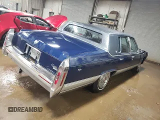 1990 Cadillac Brougham z VIN 1G6DW5474LR703771, wystawiony jako Copart lot #87653835 z przebiegiem 94 172 mil mil oraz Szkody całkowita. Historia ofert i sprzedaży dostępna na DreamBid. Obrazek 3.