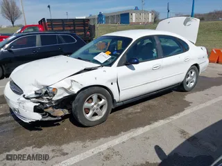 2000 Ford Taurus SE with VIN 1FAFP5327YA186258, listed as a IAAI auction lot 41795342 with 123,174 mi miles. Bid and sale history available at carsss.com. Image 2.