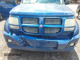 2010 Dodge Nitro SXT z VIN 1D4PT5GK0AW120120, wystawiony jako IAAI lot #42251615 z przebiegiem 114 627 mil mil oraz . Historia ofert i sprzedaży dostępna na DreamBid. Obrazek 6.
