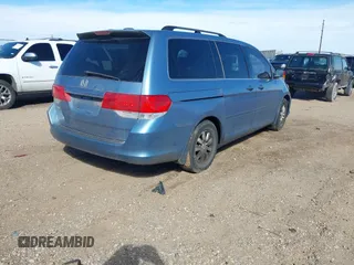 2010 Honda Odyssey EX-L with VIN 5FNRL3H7XAB052742, listed as a IAAI auction lot 41705935 with 205,190 mi miles and . Bid and sale history available at DreamBid. Image 4.