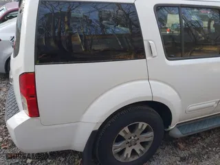 2010 Nissan Pathfinder S with VIN 5N1AR1NB5AC604679, listed as a IAAI auction lot 41774279 with 94,249 mi miles. Bid and sale history available at carsss.com. Image 16.