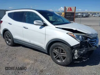 2017 Hyundai Santa Fe 2.4L z VIN 5NMZU3LB1HH045714, wystawiony jako IAAI lot #41949139 z przebiegiem 151 799 mil mil oraz . Historia ofert i sprzedaży dostępna na DreamBid. Obrazek 1.