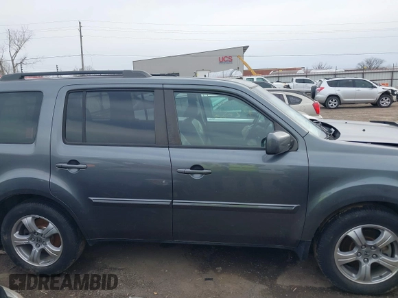2013 Honda Pilot EX-L with VIN 5FNYF4H74DB041569, listed as a IAAI auction lot 41728937 with 223,355 mi miles and . Bid and sale history available at DreamBid. Image 14.