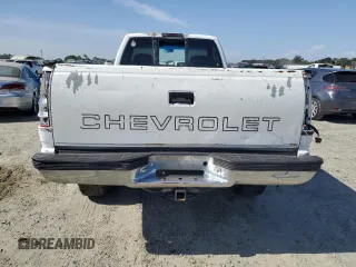 1999 GMC Sierra 1500 z VIN 1GTGC24RXXR721667, wystawiony jako Copart lot #58575985 z przebiegiem 201 752 mil mil oraz Czysty tytuł • Clean title. Historia ofert i sprzedaży dostępna na DreamBid. Obrazek 6.
