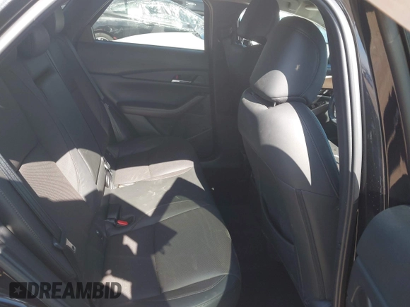 2022 Mazda CX-30 S Premium with VIN 3MVDMBDL6NM407913, listed as a IAAI auction lot 42359860 with 35,804 mi miles and . Bid and sale history available at DreamBid. Image 8.