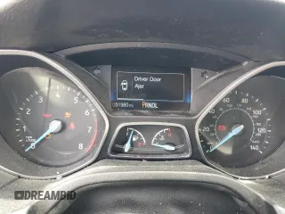2018 Ford Focus SE z VIN 1FADP3F27JL266774, wystawiony jako Copart lot #56672825 z przebiegiem 51 980 mil mil oraz Szkoda całkowita • Salvage title. Historia ofert i sprzedaży dostępna na DreamBid. Obrazek 9.