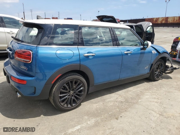 2023 MINI Clubman Cooper S with VIN WMWXJ1C06P2T78767, listed as a Copart auction lot 50398484 with 7,681 mi miles and Salvage Title. Bid and sale history available at carsss.com. Image 3.