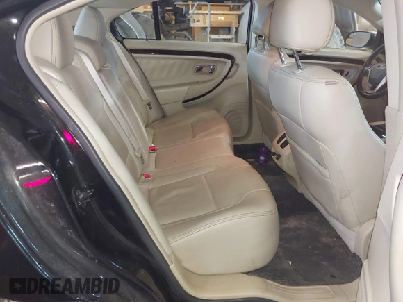 2015 Ford Taurus Limited with VIN 1FAHP2J87FG172580, listed as a IAAI auction lot 41891567 with 183,784 mi miles. Bid and sale history available at carsss.com. Image 8.