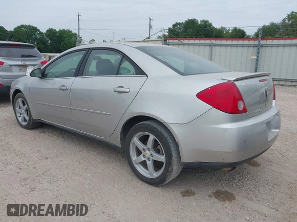 2007 Pontiac G6 with VIN 1G2ZG58N374163474, listed as a IAAI auction lot 41993283 with 210,009 mi miles. Bid and sale history available at carsss.com. Image 3.