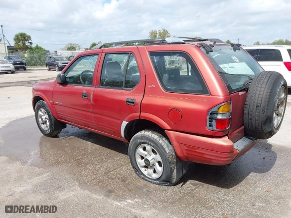 1999 Isuzu Rodeo S with VIN 4S2CK58W4X4318644, listed as a IAAI auction lot 41693386 with NaN miles. Bid and sale history available at carsss.com. Image 3.