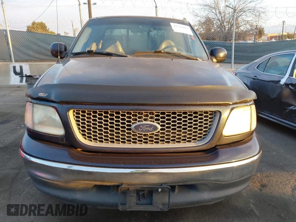 1999 Ford F-150 XL with VIN 1FTRX17L3XKB32547, listed as a IAAI auction lot 41331882 with Not Provided miles. Bid and sale history available at carsss.com. Image 12.