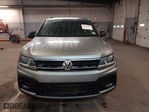 2020 Volkswagen Tiguan SE with VIN 3VV2B7AX5LM149305, listed as a IAAI auction lot 41920685 with 30,512 mi miles and . Bid and sale history available at DreamBid. Image 12.