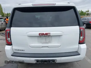 2019 GMC Yukon SLT with VIN 1GKS2BKC3KR160060, listed as a IAAI auction lot 42042122 with 124,733 mi miles. Bid and sale history available at carsss.com. Image 17.