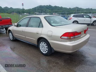 2002 Honda Accord LX z VIN JHMCG56402C025464, wystawiony jako IAAI lot #42458693 z przebiegiem 257 711 mil mil oraz . Historia ofert i sprzedaży dostępna na DreamBid. Obrazek 3.