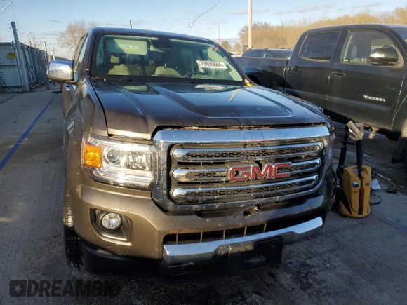 2020 GMC Canyon 4WD SLT with VIN 1GTG6DEN8L1117560, listed as a Copart auction lot 79890664 with 80,260 mi miles and Salvage Title. Bid and sale history available at carsss.com. Image 5.