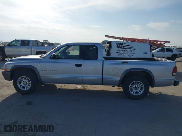2002 Dodge Dakota with VIN 1B7GL12X62S538389, listed as a IAAI auction lot 41533809 with 159,576 mi miles and . Bid and sale history available at carsss.com. Image 14.