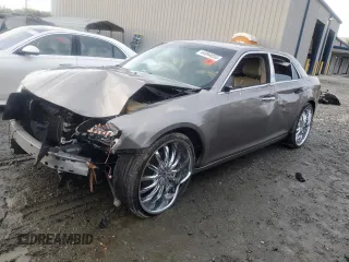 2014 Chrysler 300 with VIN 2C3CCAEG8EH156827, listed as a Copart auction lot 44994055 with 81,210 mi miles and Salvage Title. Bid and sale history available at carsss.com. Image 1.