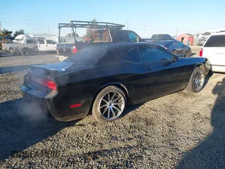 2013 Dodge Challenger R/T z VIN 2C3CDYBT1DH501055, wystawiony jako IAAI lot #41424579 z przebiegiem 156 492 mil mil oraz . Historia ofert i sprzedaży dostępna na DreamBid. Obrazek 4.