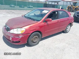 2005 Toyota Corolla CE with VIN 1NXBR32E55Z411298, listed as a IAAI auction lot 42082065 with 220,695 mi miles. Bid and sale history available at carsss.com. Image 2.