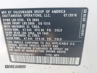 2018 Volkswagen Atlas SEL with VIN 1V2ER2CA5JC586141, listed as a IAAI auction lot 41637882 with 80,515 mi miles and . Bid and sale history available at DreamBid. Image 9.