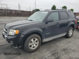2011 Ford Escape Hybrid with VIN 1FMCU4K36BKB25314, listed as a Copart auction lot 60863695 with 165,013 mi miles and Salvage title. Bid and sale history available at DreamBid. Image 1.
