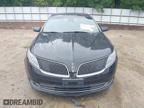 2014 Lincoln MKS z VIN 1LNHL9DK0EG610145, wystawiony jako IAAI lot #42348345 z przebiegiem 61 289 mil mil oraz . Historia ofert i sprzedaży dostępna na DreamBid. Obrazek 13.