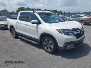 2019 Honda Ridgeline RTL-E with VIN 5FPYK3F77KB021667, listed as a IAAI auction lot 42115019 with 87,221 mi miles and . Bid and sale history available at DreamBid. Image 1.