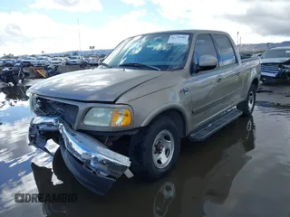 2003 Ford F-150 XLT with VIN 1FTRW07L53KD82167, listed as a IAAI auction lot 41745801 with 216,783 mi miles. Bid and sale history available at carsss.com. Image 2.
