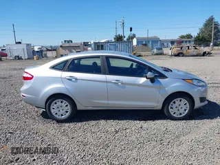 2017 Ford Fiesta S z VIN 3FADP4AJ4HM132253, wystawiony jako IAAI lot #42020157 z przebiegiem 70 942 mil mil oraz . Historia ofert i sprzedaży dostępna na DreamBid. Obrazek 13.