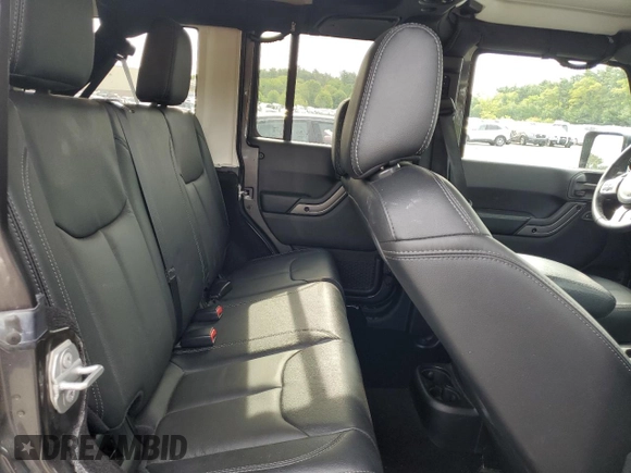 2018 Jeep Wrangler Unlimited Sahara with VIN 1C4BJWEG8JL821569, listed as a Copart auction lot 57949745 with 40,048 mi miles and Salvage title. Bid and sale history available at DreamBid. Image 11.