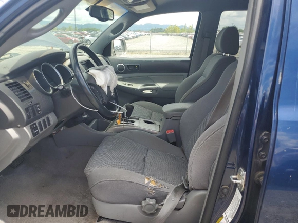 2005 Toyota Tacoma PreRunner with VIN 5TEKU72N55Z098139, listed as a Copart auction lot 57266715 with 144,890 mi miles and Salvage title. Bid and sale history available at DreamBid. Image 7.