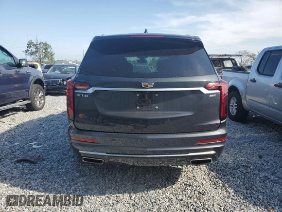 2021 Cadillac XT6 Premium Luxury with VIN 1GYKPCRS1MZ199288, listed as a Copart auction lot 54264995 with 51,432 mi miles and Salvage Title. Bid and sale history available at carsss.com. Image 6.