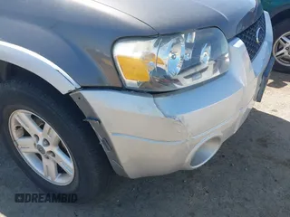 2006 Ford Escape Hybrid with VIN 1FMCU96H86KC82075, listed as a IAAI auction lot 41966536 with 91,270 mi miles and . Bid and sale history available at DreamBid. Image 6.