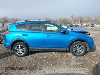 2016 Toyota RAV4 XLE with VIN JTMRFREV4GD186580, listed as a IAAI auction lot 40916703 with 117,120 mi miles and . Bid and sale history available at DreamBid. Image 13.