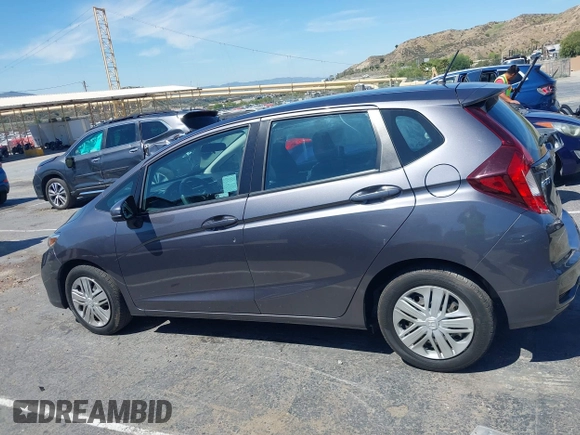 2020 Honda Fit LX with VIN 3HGGK5H40LM707356, listed as a IAAI auction lot 42076367 with 10,145 mi miles and . Bid and sale history available at DreamBid. Image 14.
