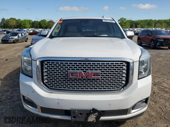 2015 GMC Yukon Denali z VIN 1GKS2CKJ9FR622342, wystawiony jako Copart lot #53671555 z przebiegiem Nie podano mil oraz Czysty tytuł • Clean title. Historia ofert i sprzedaży dostępna na DreamBid. Obrazek 5.